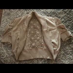 Tan cardigan sweater, crocheted back panel